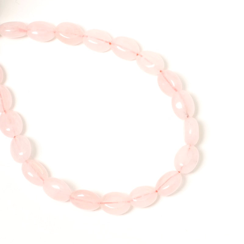 Fil de 38cm de perles ovales 6x8mm en Quartz rose