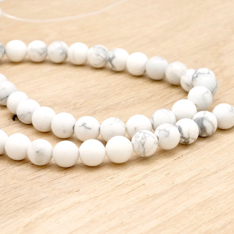 Fil de 30 perles 6mm de Howlite naturelles effet marbré blanc gris 